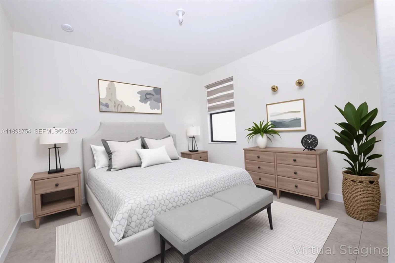 3412 West 103rd Terrace Hialeah, FL 33018 - Photo 13 of 44 a bedroom with a bed and a potted plant