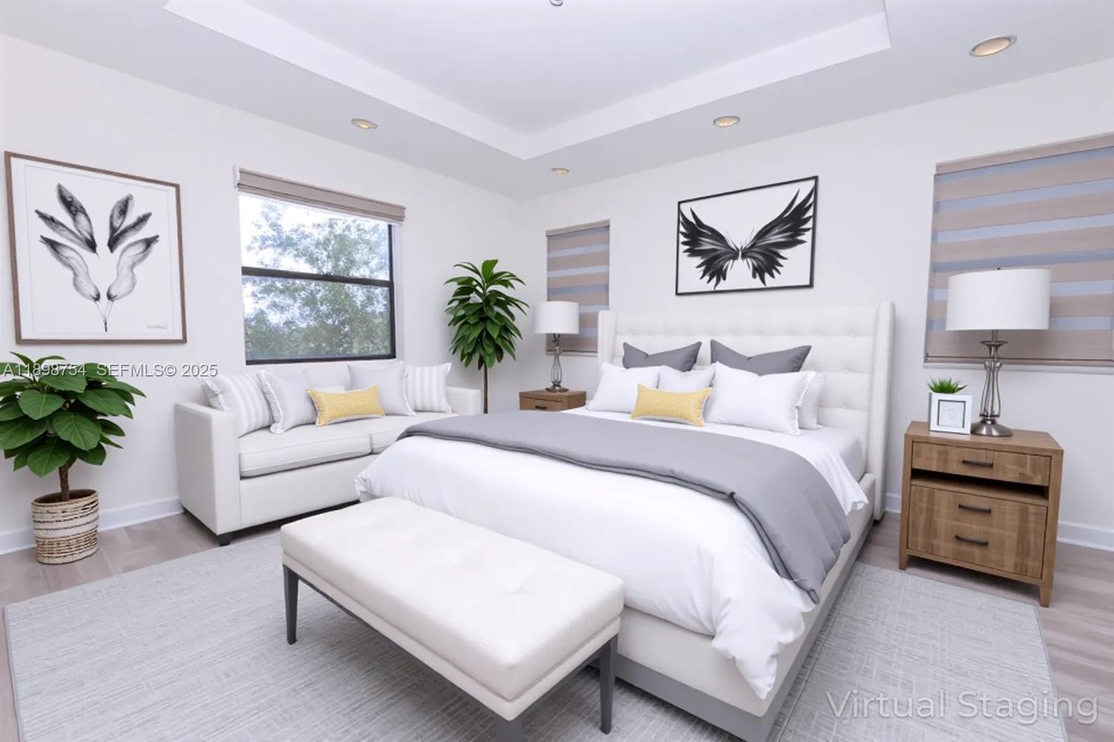 3412 West 103rd Terrace Hialeah, FL 33018 - Photo 19 of 44 a bedroom with a bed a couch and potted plant