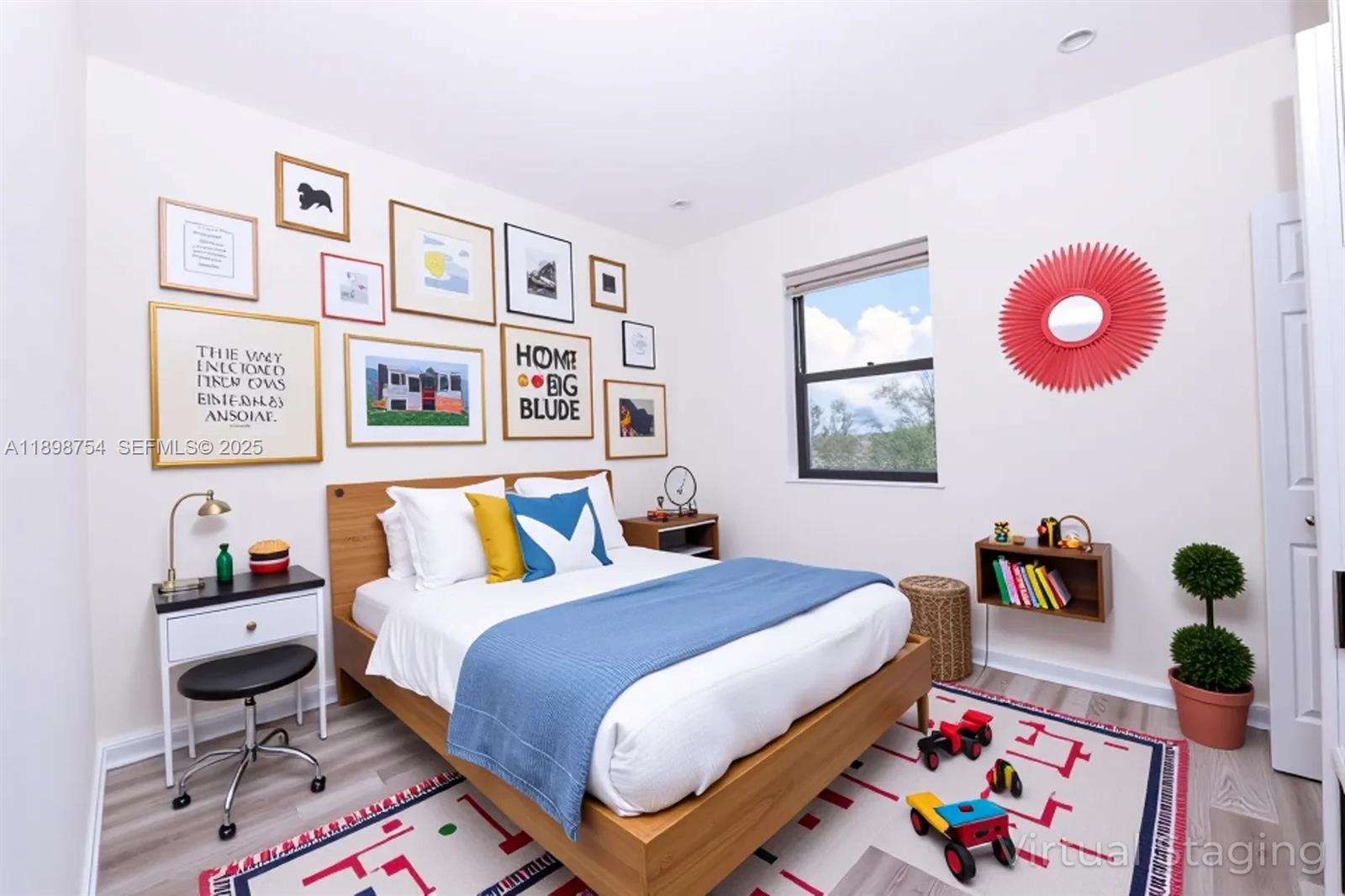 3412 West 103rd Terrace Hialeah, FL 33018 - Photo 30 of 44 a bedroom with a bed and dresser