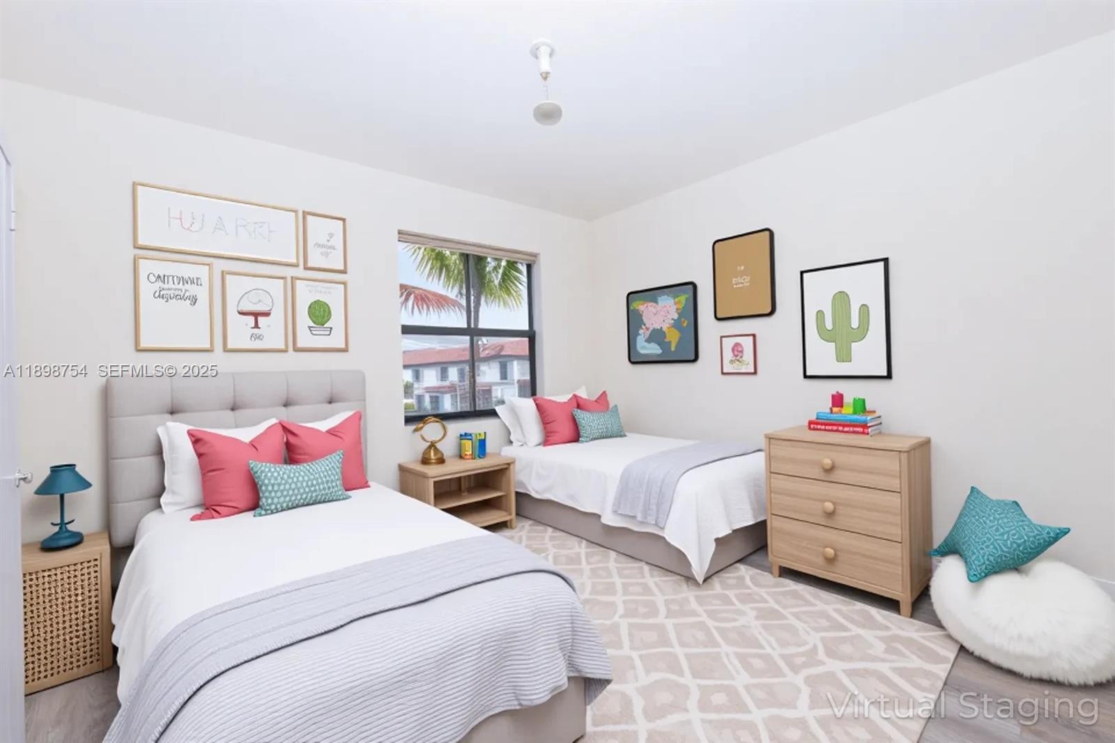 3412 West 103rd Terrace Hialeah, FL 33018 - Photo 36 of 44 a bedroom with two beds and painting on the wall