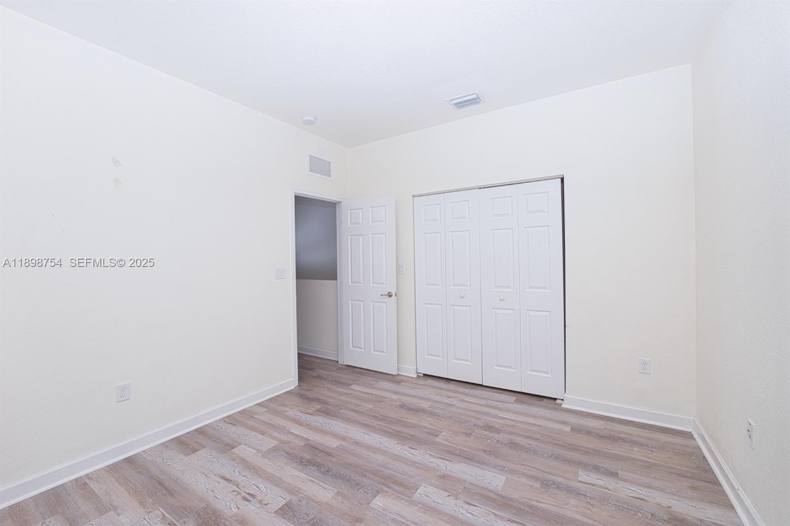 3412 West 103rd Terrace Hialeah, FL 33018 - Photo 38 of 44 a view of an empty room