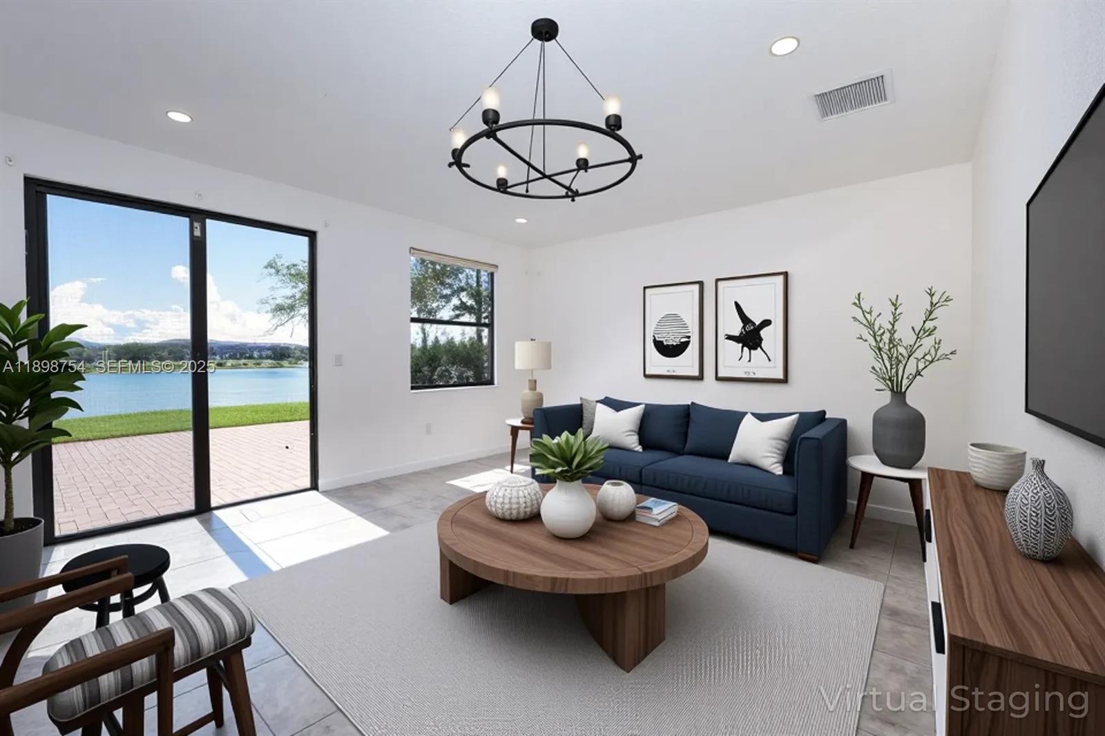 3412 West 103rd Terrace Hialeah, FL 33018 - Photo 7 of 44 a living room with furniture