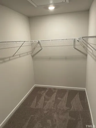 a view of a room with racks on the wall
