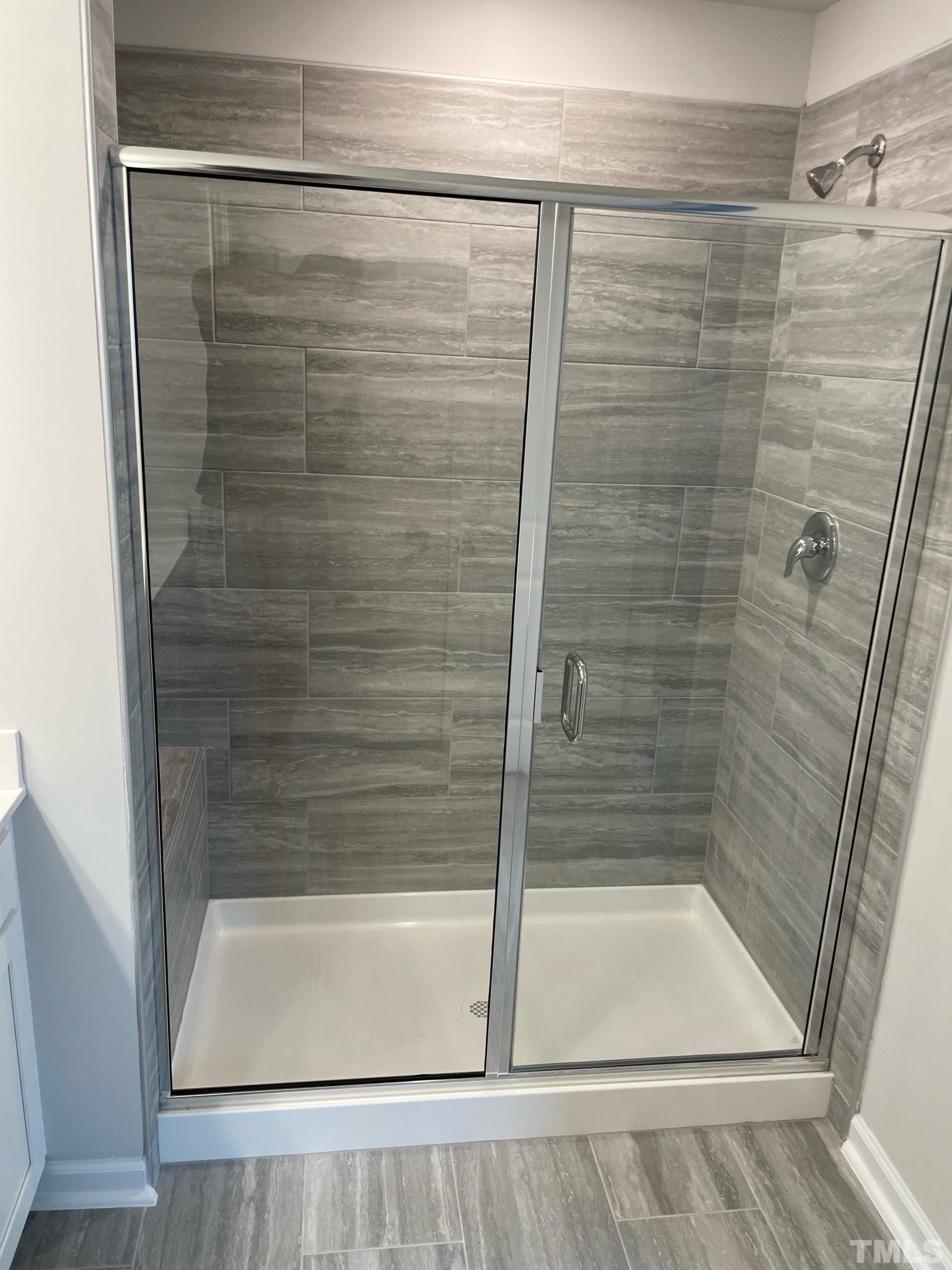 4914 Oolite Street, Unit 15 Raleigh, NC 27610 - Photo 10 of 21 a bathroom with a shower