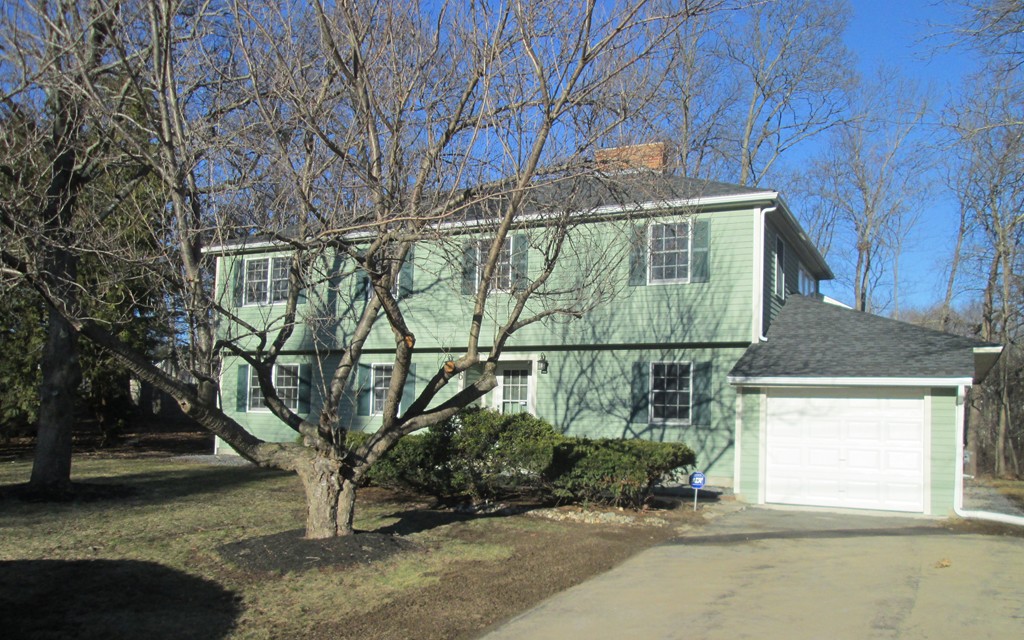 6 Peachtree Road Lexington, MA 02420 - Photo 1 of 1 a backyard of a house with lots of green space