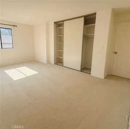 an empty room with closet