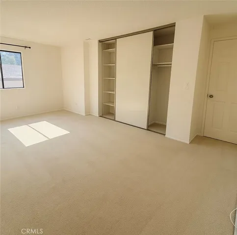 an empty room with closet