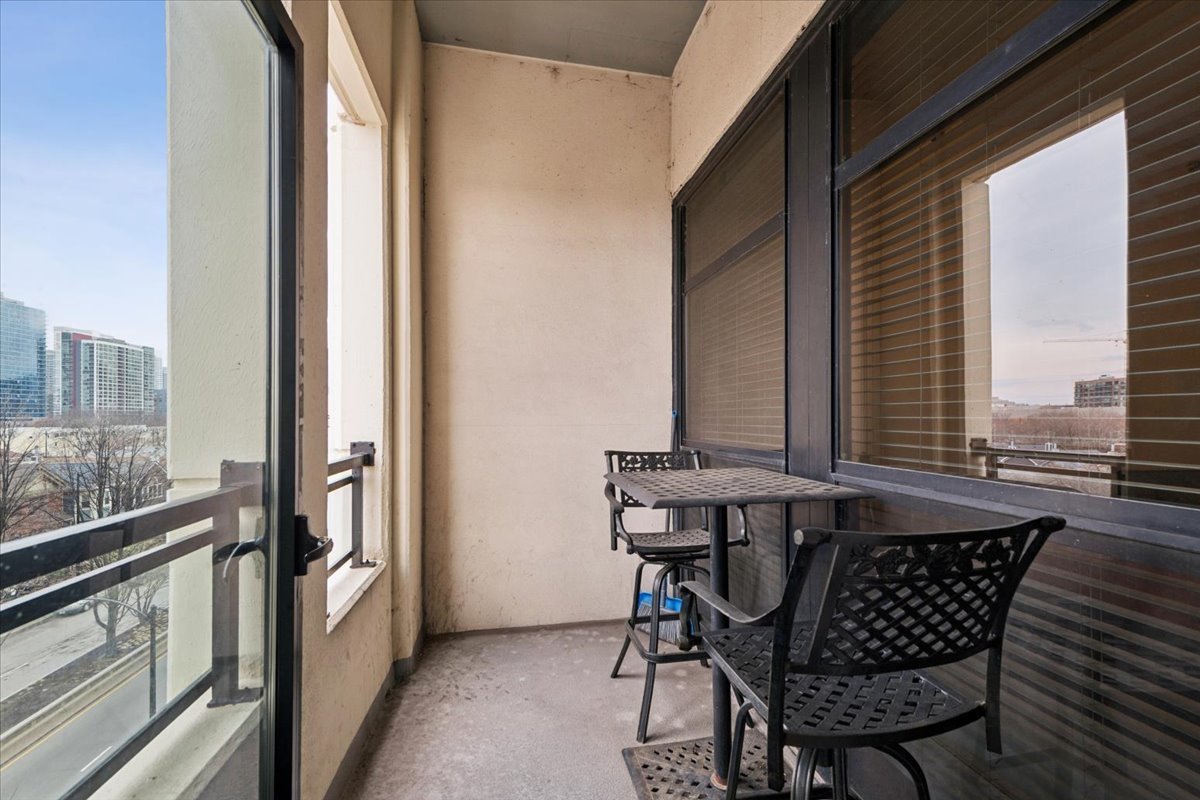 1255 South State Street, Unit 502 Chicago, IL 60605 - Photo 11 of 13 a view of an outdoor sitting area with furniture and stairs