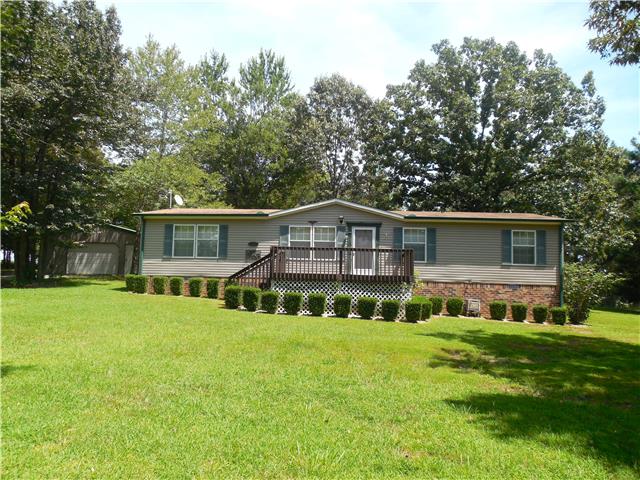 2410 Sylvia Road Dickson, TN 37055 - Photo 1 of 19 Welcome to 2410 Sylvia Rd. Lots of tasteful and easy-to-maintain landscaping and permanent, red brick foundation.