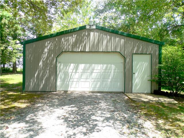 2410 Sylvia Road Dickson, TN 37055 - Photo 17 of 19 This garage measures 23x23 and includes an automatic garage door opener. Lots of room to park and store all the tools and lawn equipment.