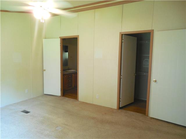 2410 Sylvia Road Dickson, TN 37055 - Photo 6 of 19 The master bedroom has a large closet and a private bath with 2 more closets!
