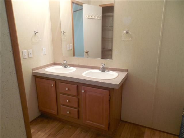 2410 Sylvia Road Dickson, TN 37055 - Photo 9 of 19 The master bathroom has a double vanity and lots of extra space