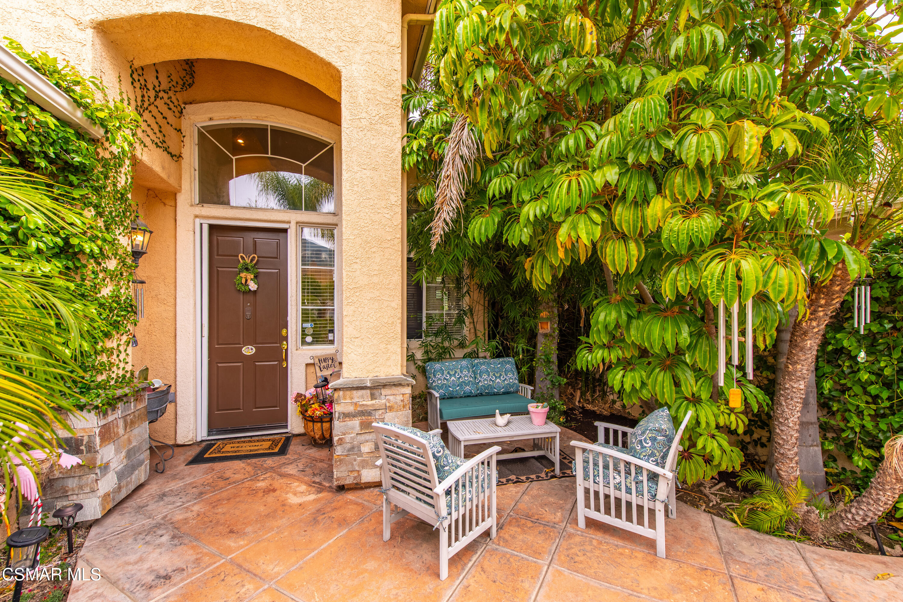 295 Cliffwood Drive Simi Valley, CA 93065 - Photo 2 of 49 a view of a patio with table and chairs and potted plants
