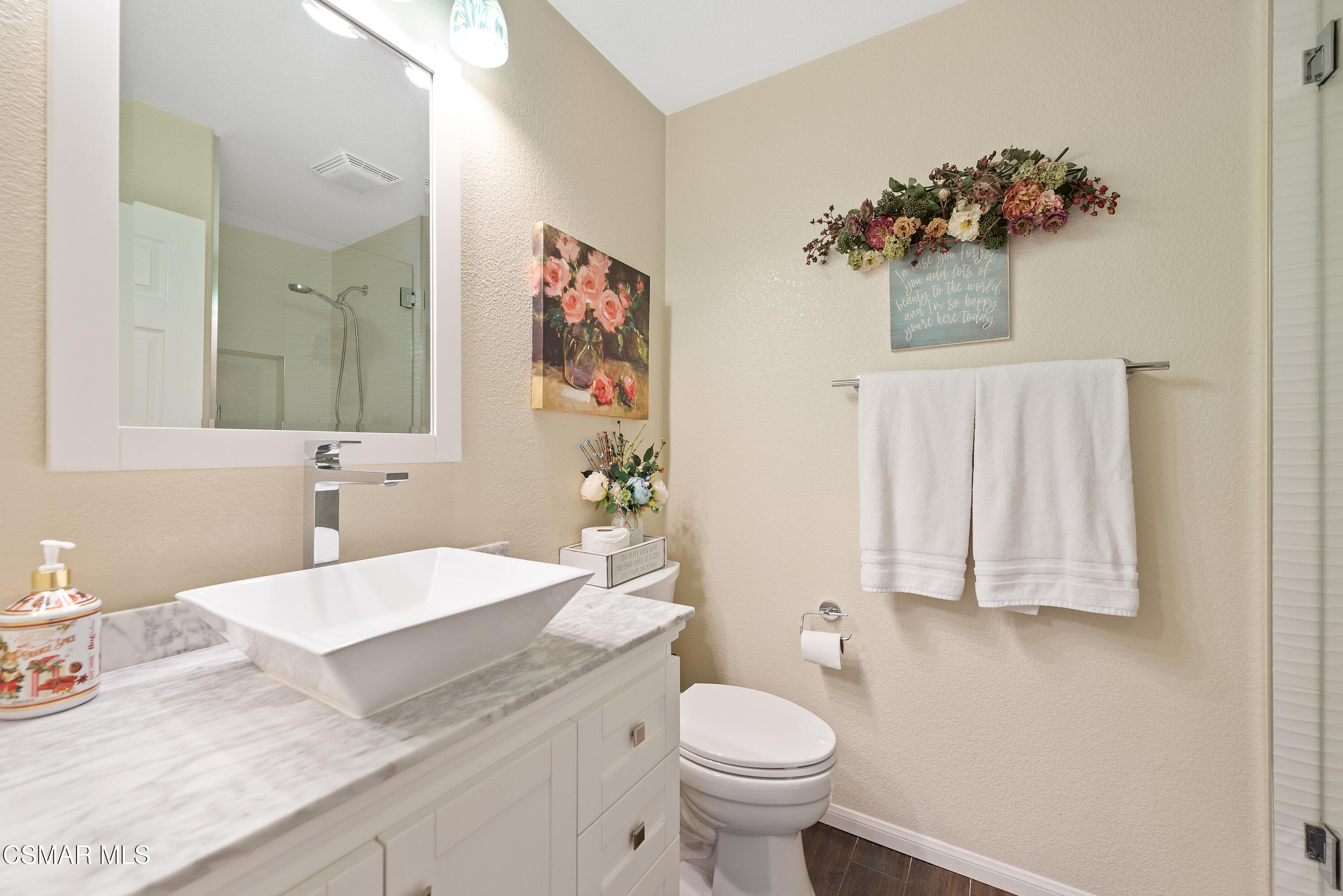 295 Cliffwood Drive Simi Valley, CA 93065 - Photo 21 of 49 a bathroom with a sink a toilet and mirror
