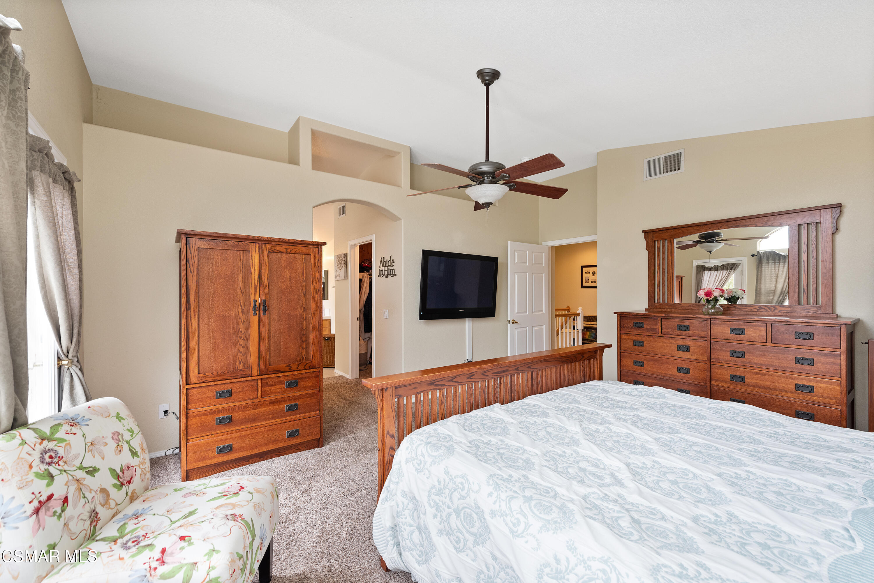 295 Cliffwood Drive Simi Valley, CA 93065 - Photo 31 of 49 a bedroom with a bed and a flat screen tv