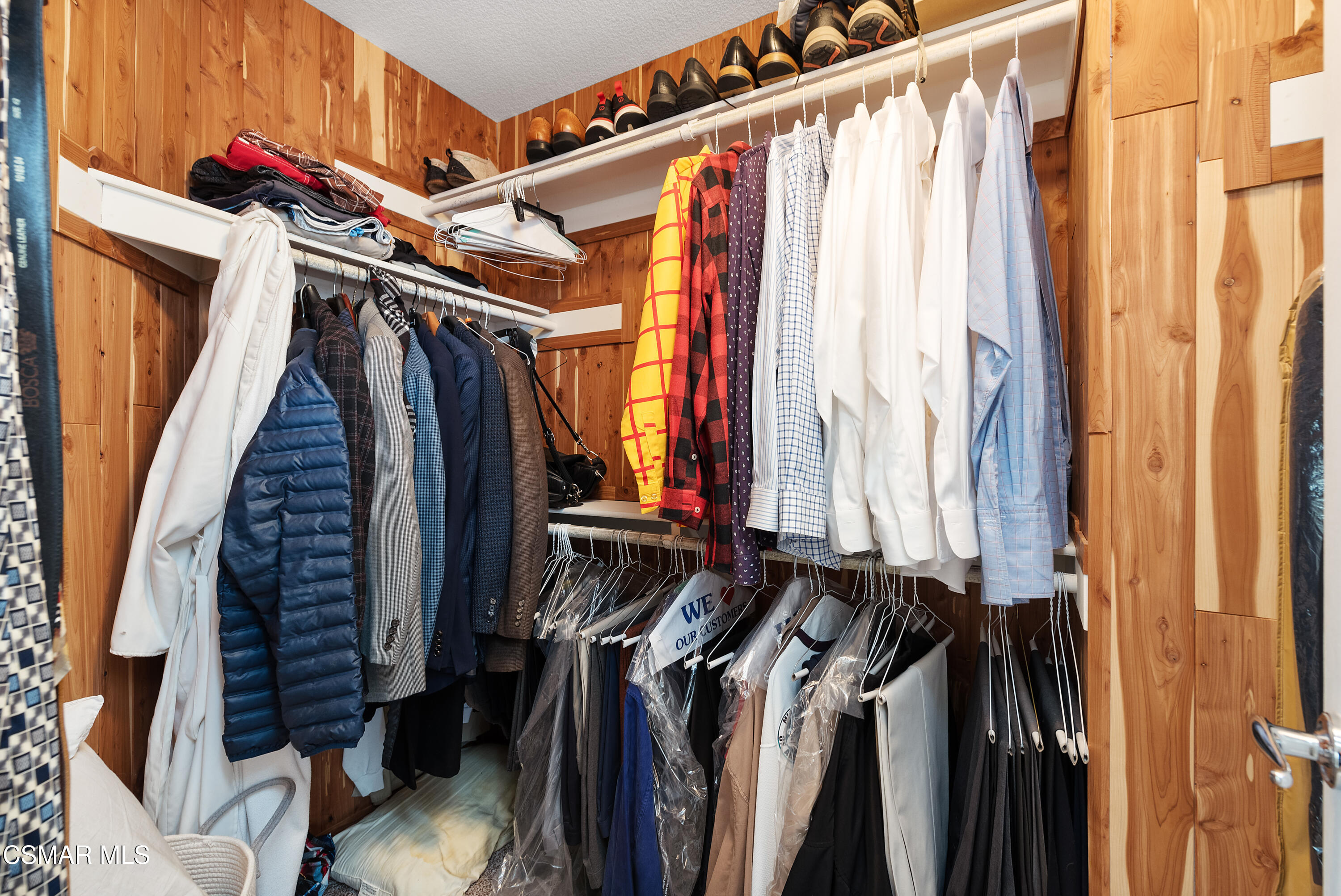 295 Cliffwood Drive Simi Valley, CA 93065 - Photo 32 of 49 a view of walk in closet with clothes and shoes