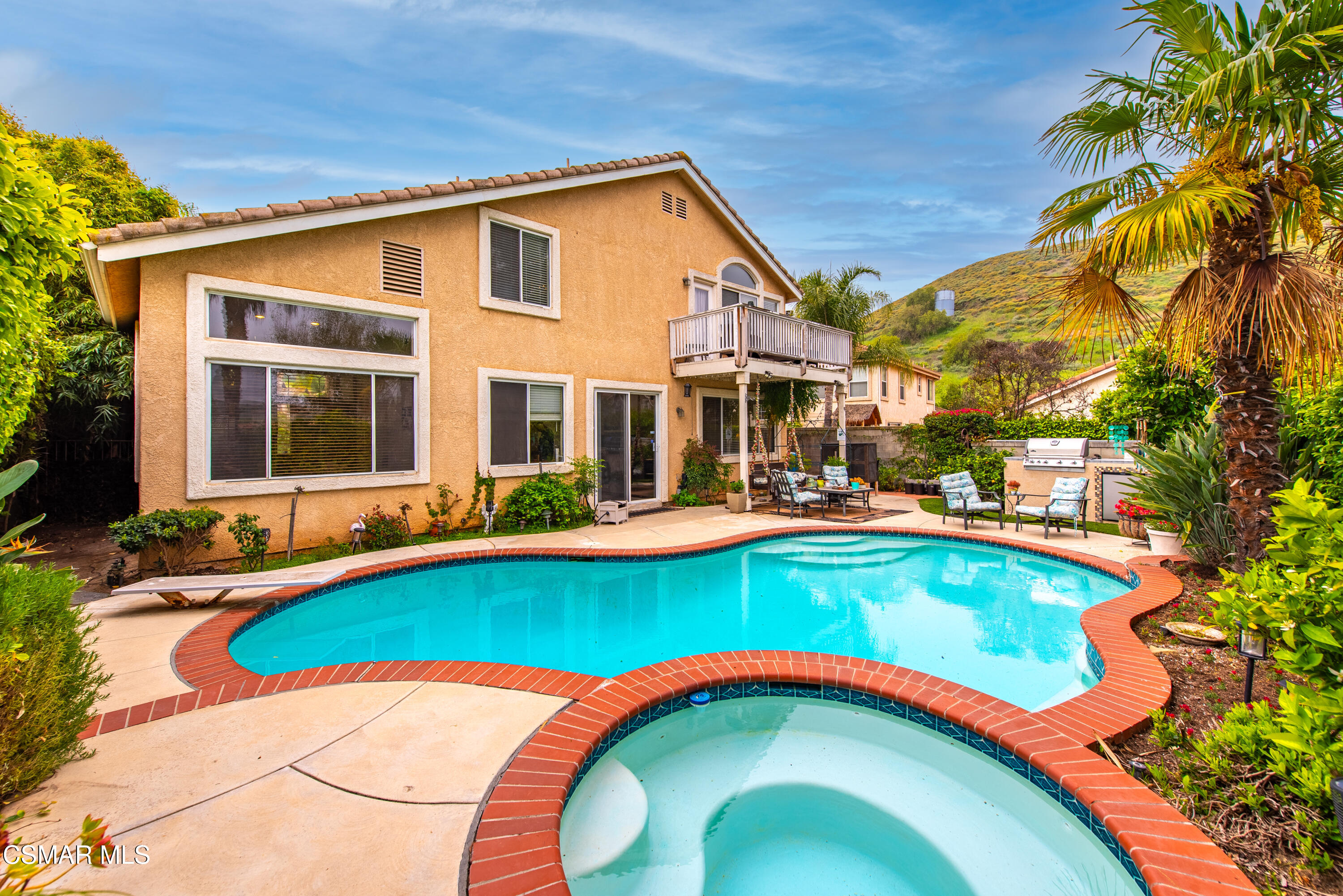 295 Cliffwood Drive Simi Valley, CA 93065 - Photo 45 of 49 a swimming pool with outdoor seating and yard