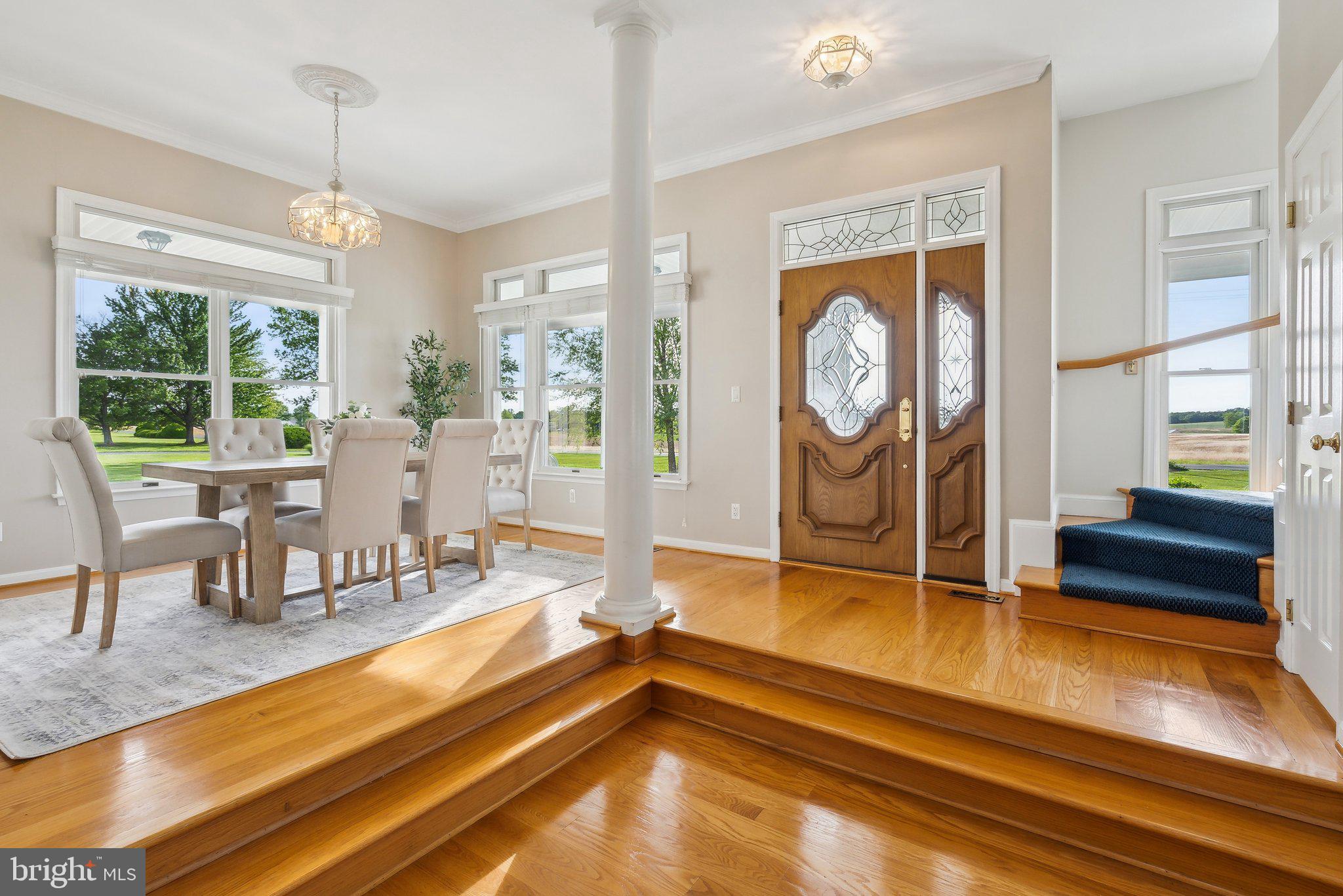 20437 Peach Tree Road Dickerson, MD 20842 - Photo 13 of 53 a living room with furniture a flat screen tv and a large window