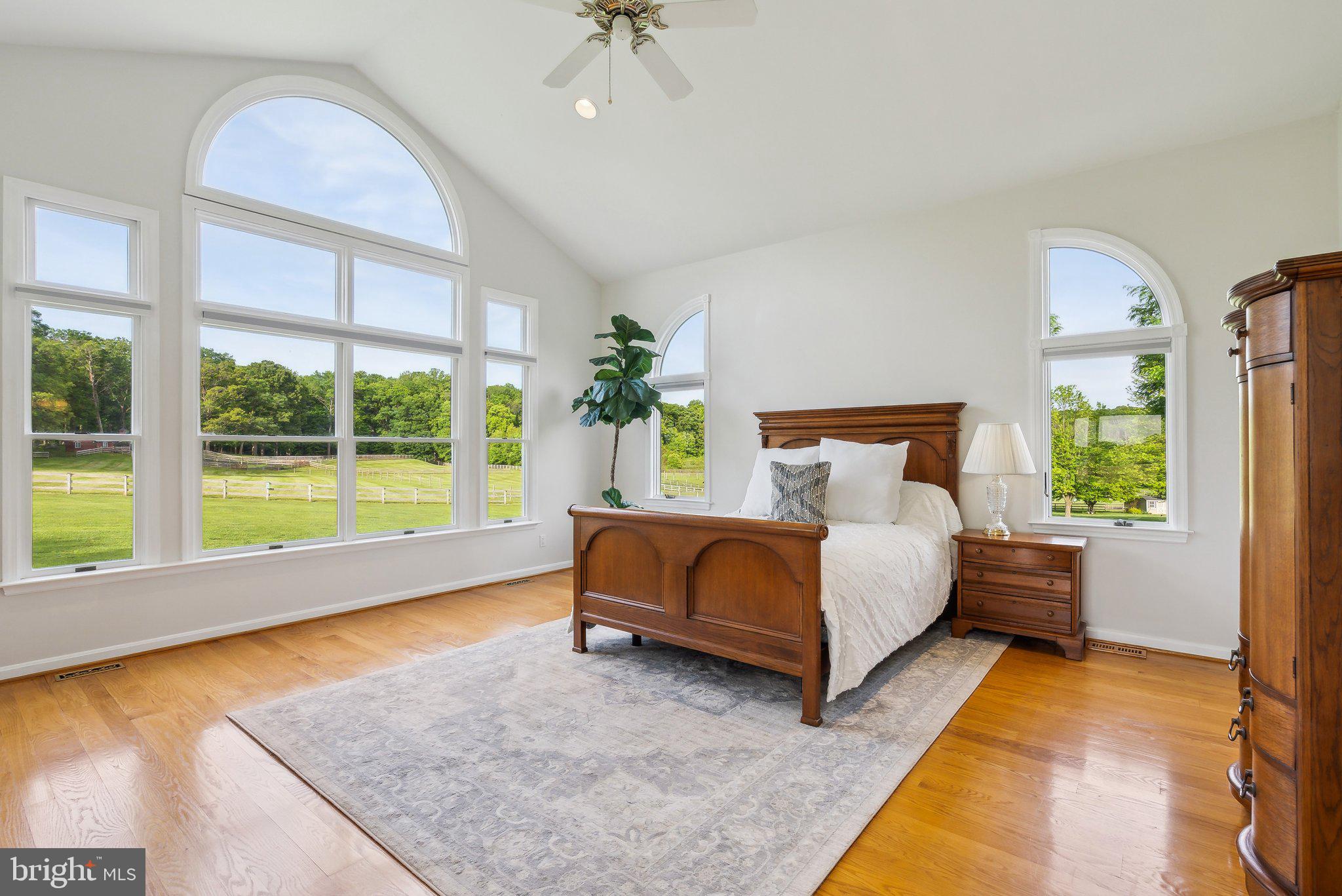 20437 Peach Tree Road Dickerson, MD 20842 - Photo 21 of 53 a bed sitting in a bedroom next to a window
