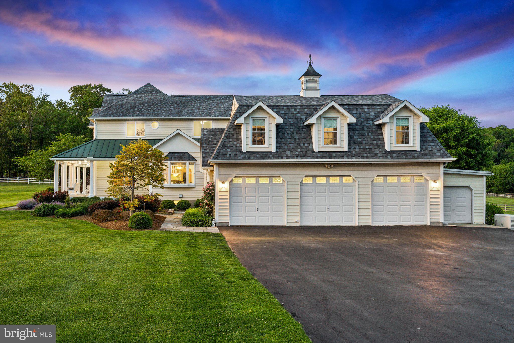 20437 Peach Tree Road Dickerson, MD 20842 - Photo 3 of 53 a front view of a house with a yard