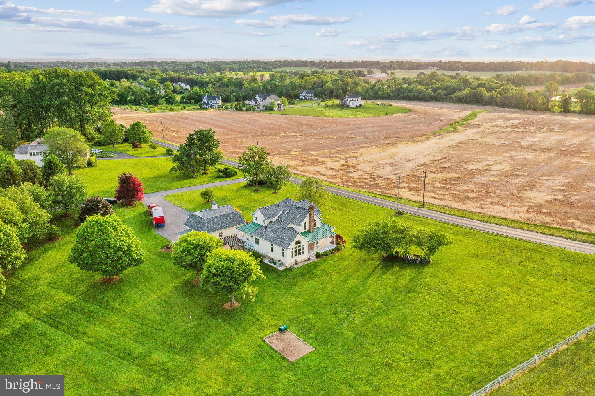 20437 Peach Tree Road Dickerson, MD 20842 - Photo 40 of 53 a view of a lake with a big yard