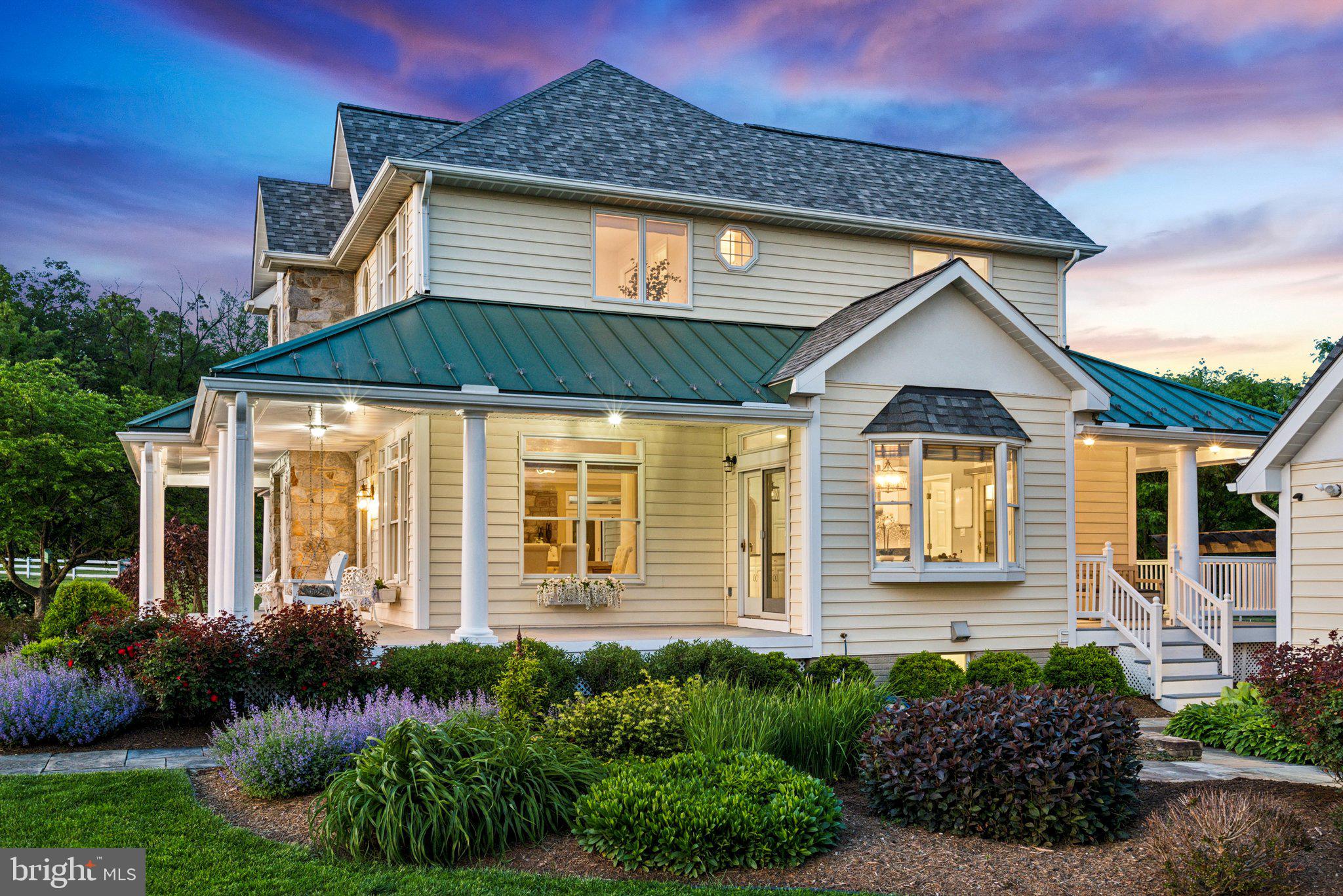 20437 Peach Tree Road Dickerson, MD 20842 - Photo 4 of 53 a front view of a house with a yard