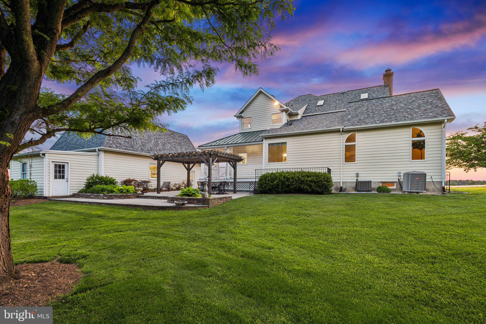 20437 Peach Tree Road Dickerson, MD 20842 - Photo 6 of 53 a front view of a house with a garden and deck