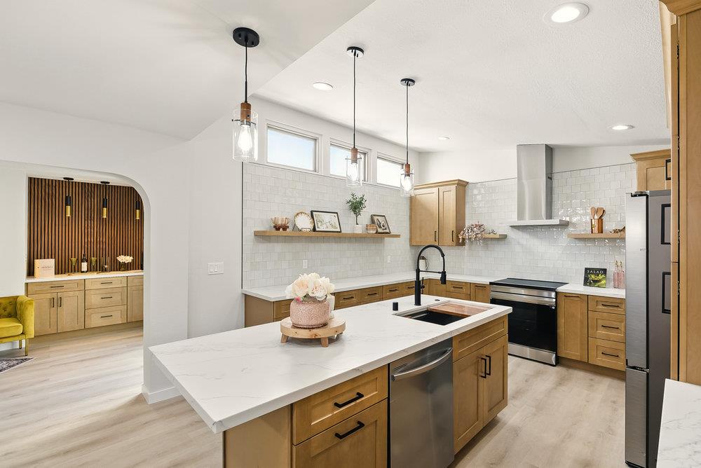 1180 Peterson Drive Gilroy, CA 95020 - Photo 20 of 45 a kitchen with a sink and stove