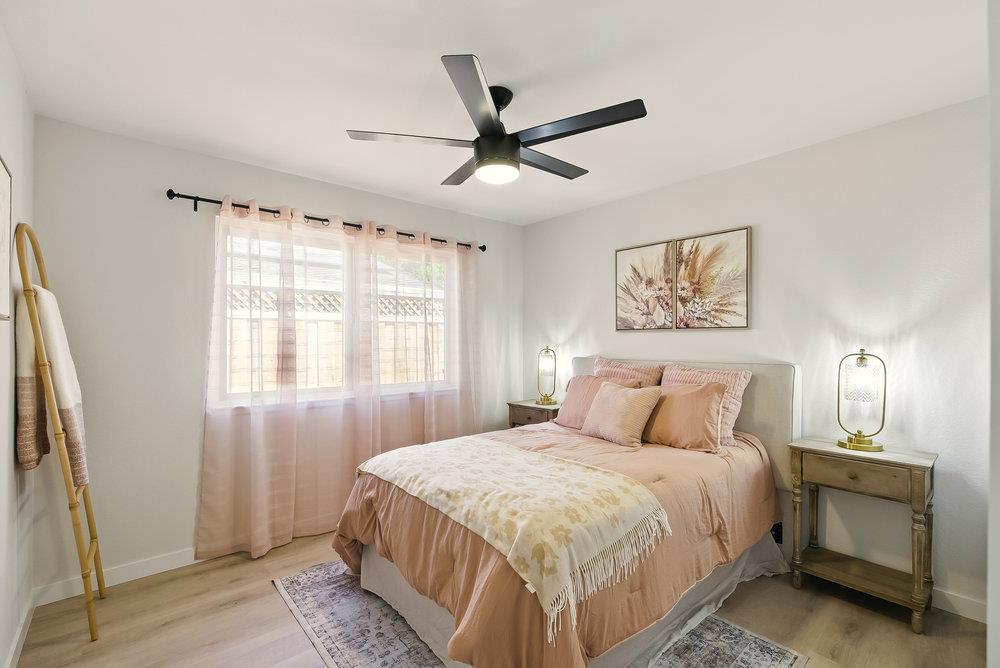 1180 Peterson Drive Gilroy, CA 95020 - Photo 28 of 45 a bedroom with a large bed and a window
