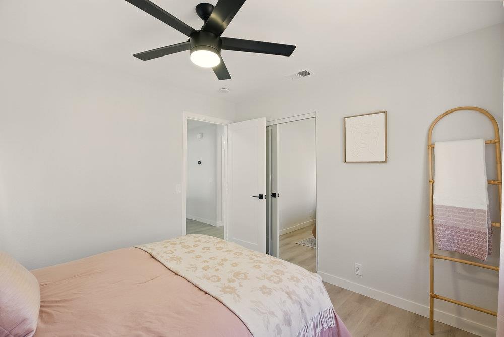 1180 Peterson Drive Gilroy, CA 95020 - Photo 29 of 45 a bedroom with a bed and a dresser