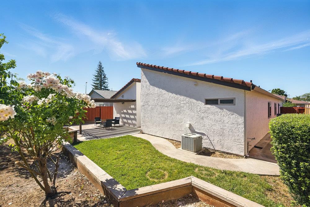 1180 Peterson Drive Gilroy, CA 95020 - Photo 44 of 45 a view of a house with a yard potted plants and wooden fence
