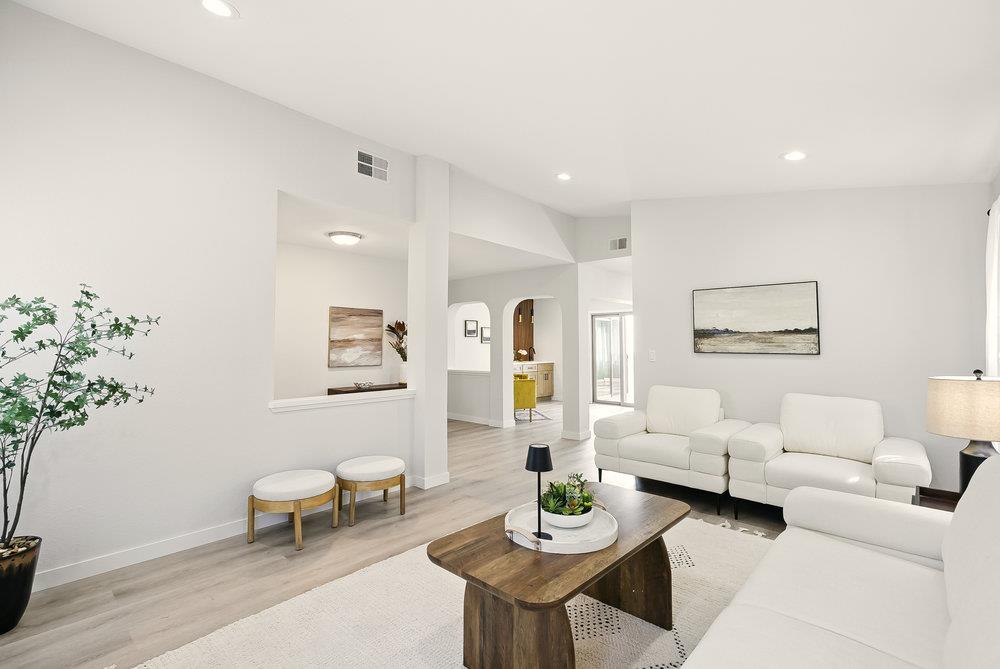 1180 Peterson Drive Gilroy, CA 95020 - Photo 9 of 45 a living room with furniture and flowers