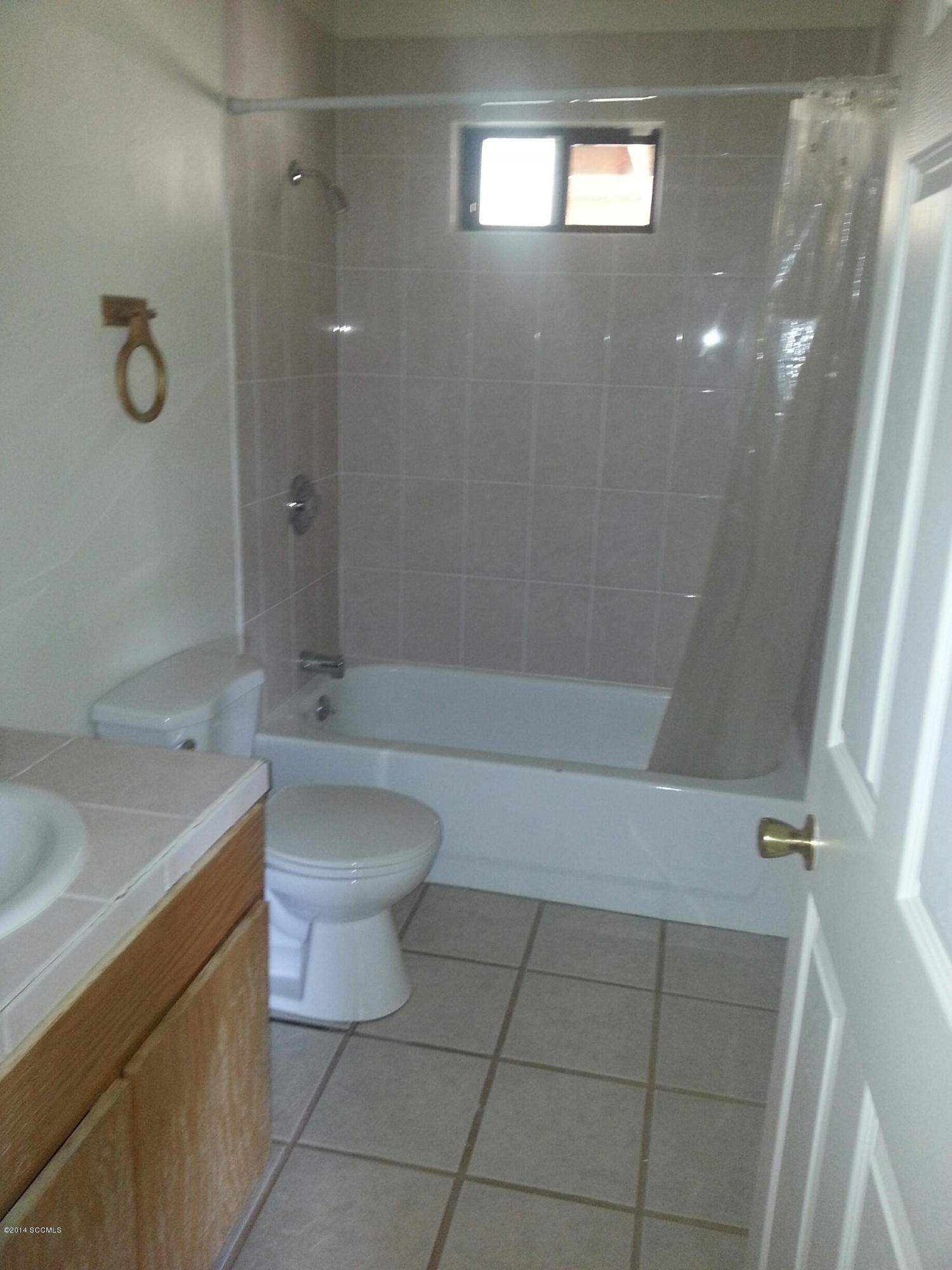315 Camino Arenosa Rio Rico, AZ 85648 - Photo 6 of 11 a bathroom with a toilet a sink and bathtub