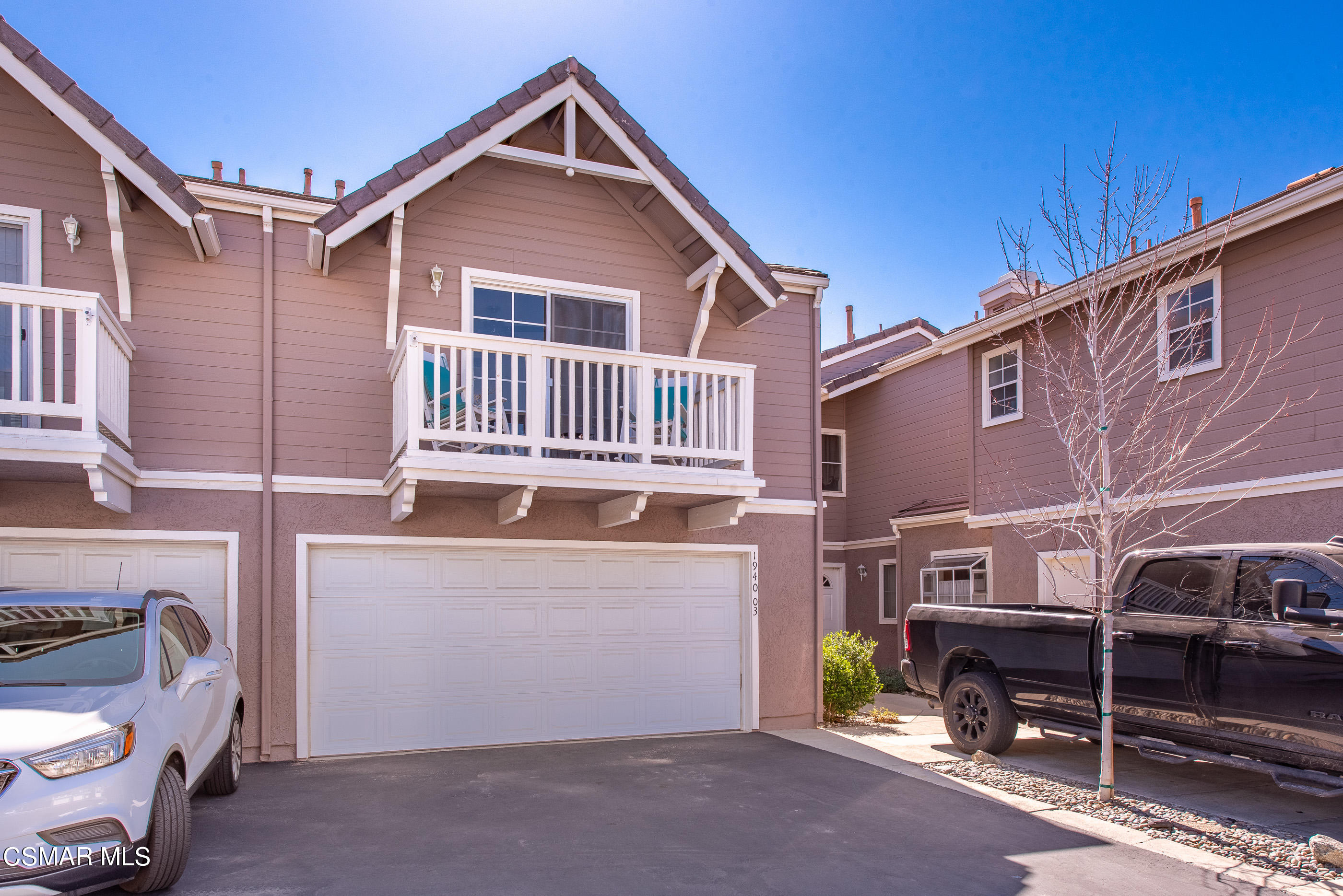 1940 Rory Lane, Unit 3 Simi Valley, CA 93063 - Photo 1 of 33 a front view of a house with parking
