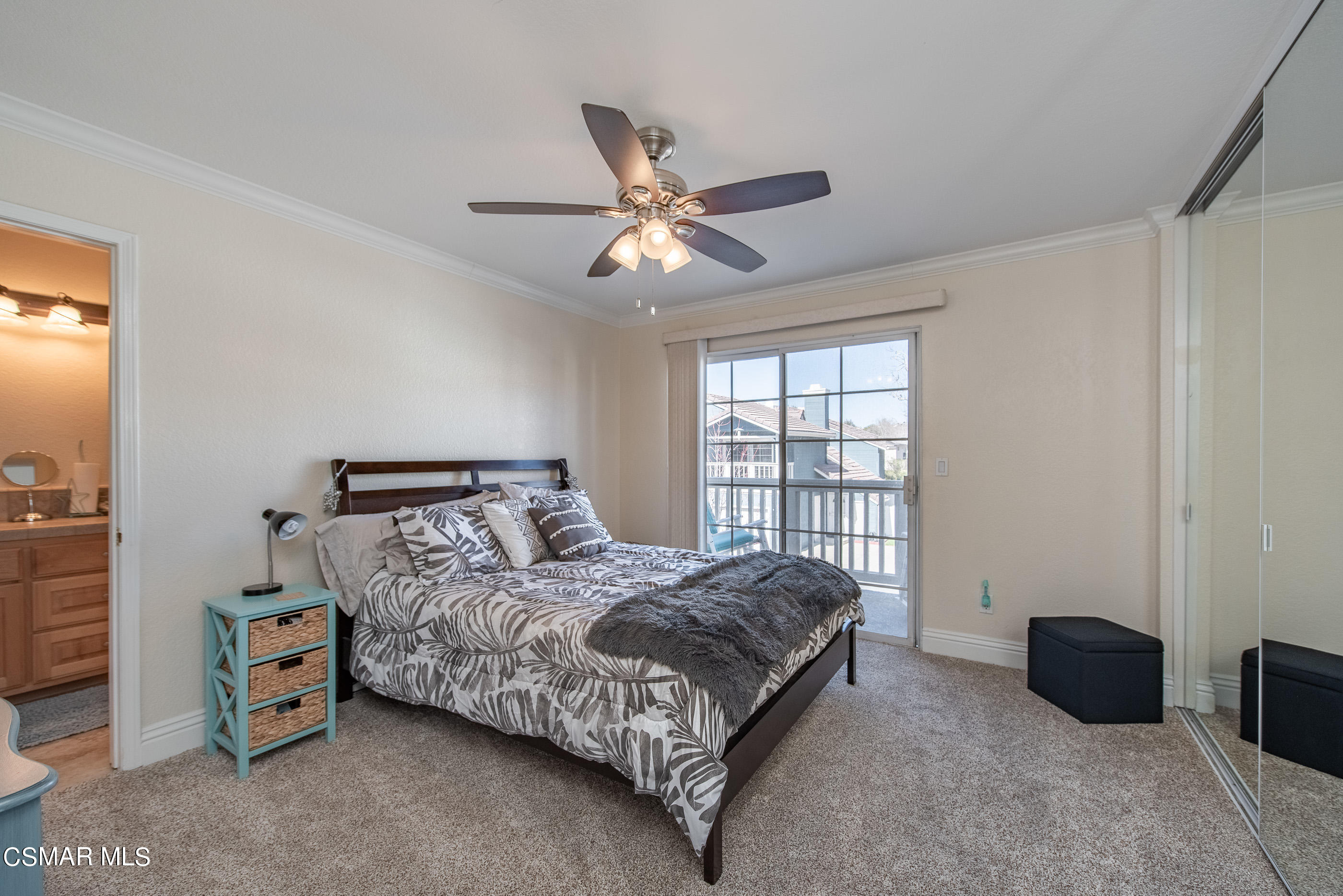 1940 Rory Lane, Unit 3 Simi Valley, CA 93063 - Photo 15 of 33 a bed sitting in a bedroom next to a window