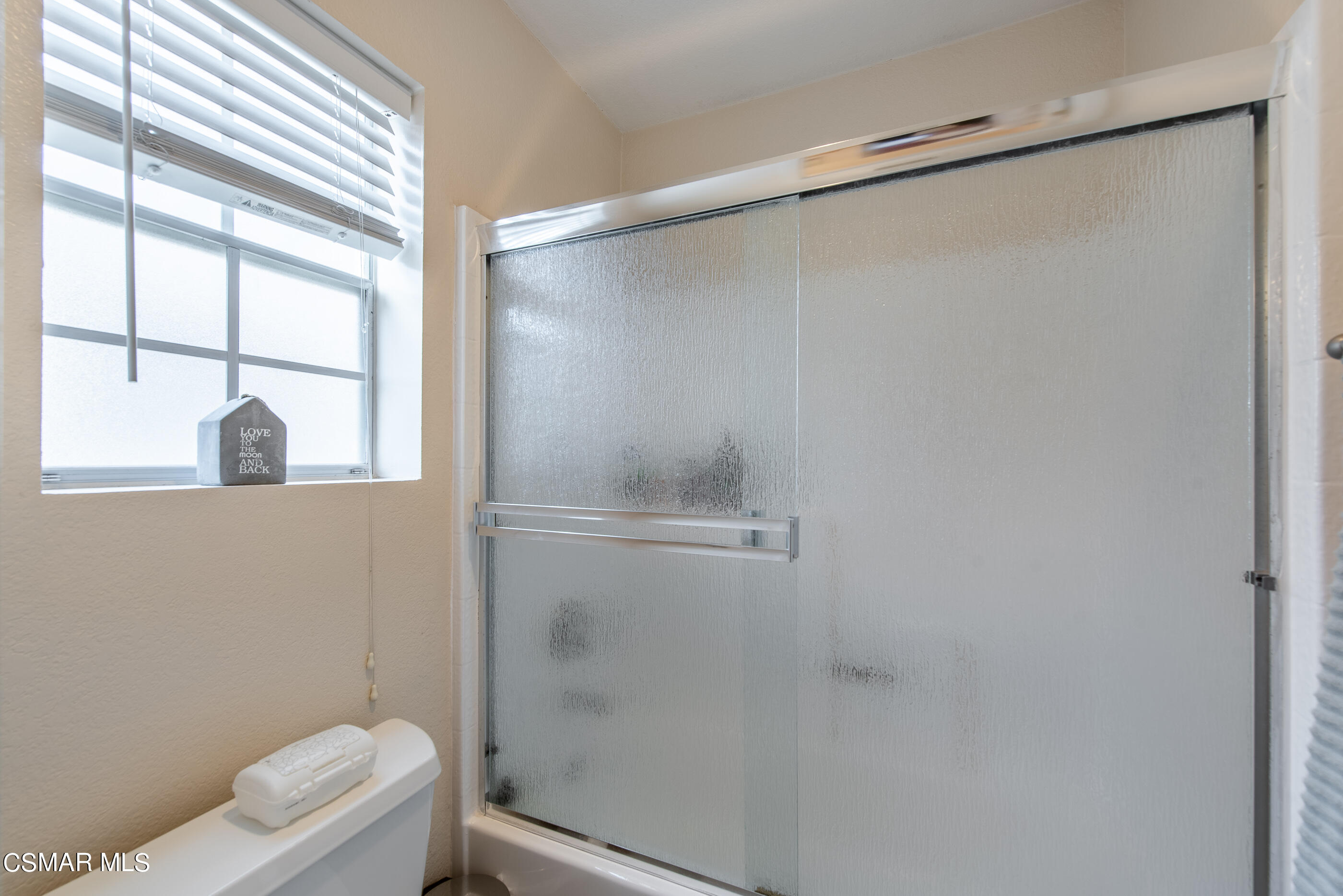 1940 Rory Lane, Unit 3 Simi Valley, CA 93063 - Photo 19 of 33 a bathroom with a shower and a toilet