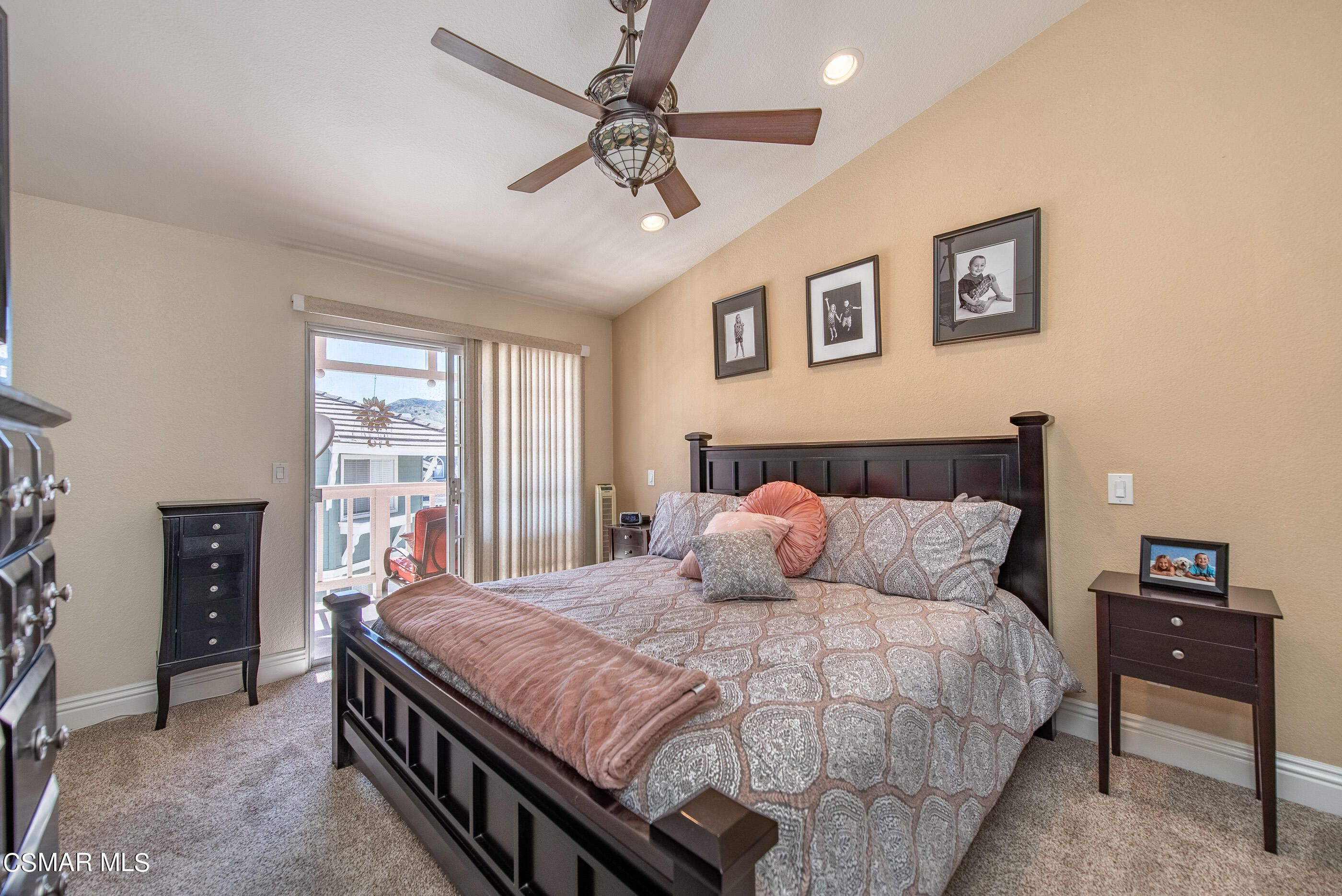 1940 Rory Lane, Unit 3 Simi Valley, CA 93063 - Photo 20 of 33 a bedroom with a large bed and a tv