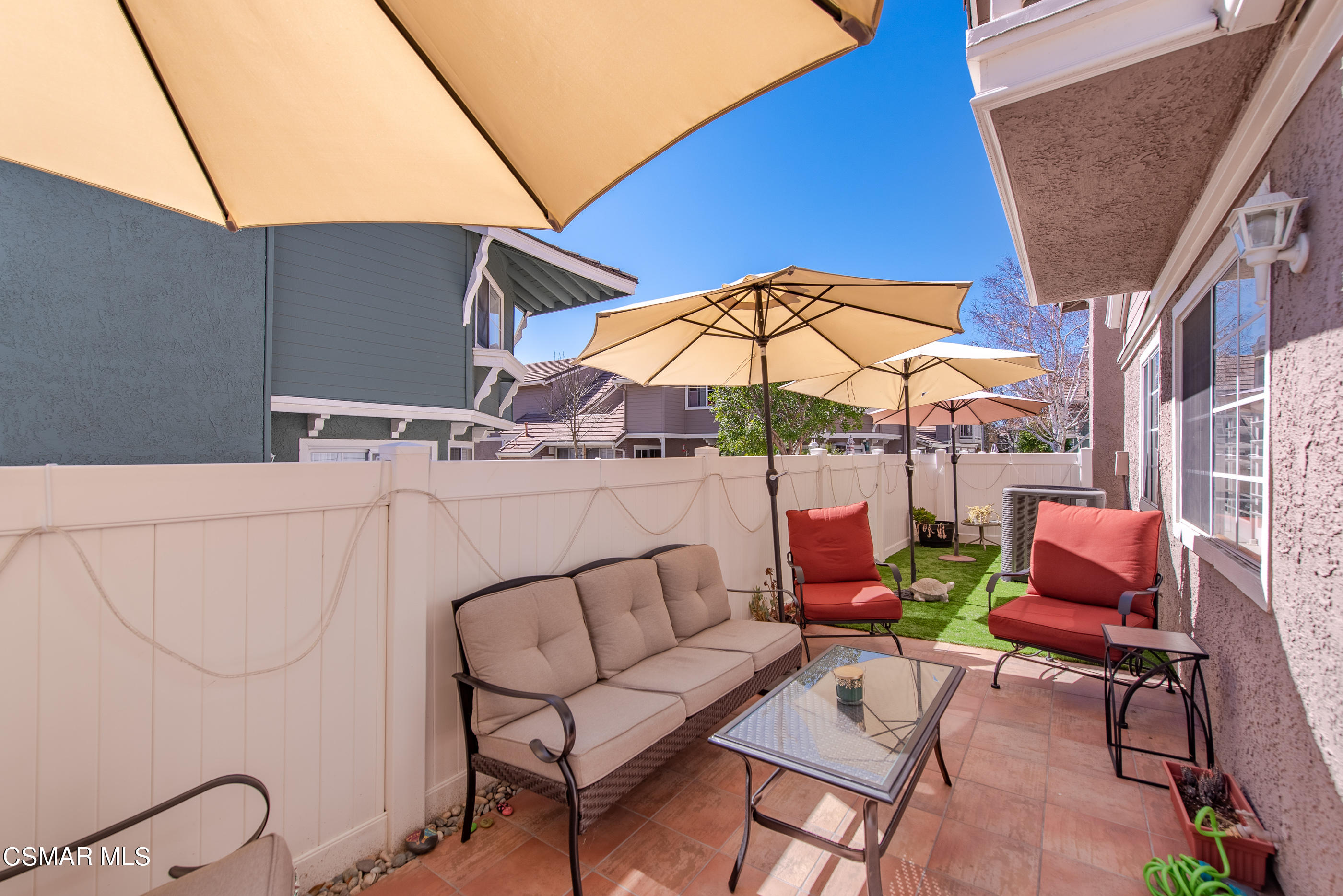 1940 Rory Lane, Unit 3 Simi Valley, CA 93063 - Photo 25 of 33 a view of a chairs and table in the patio