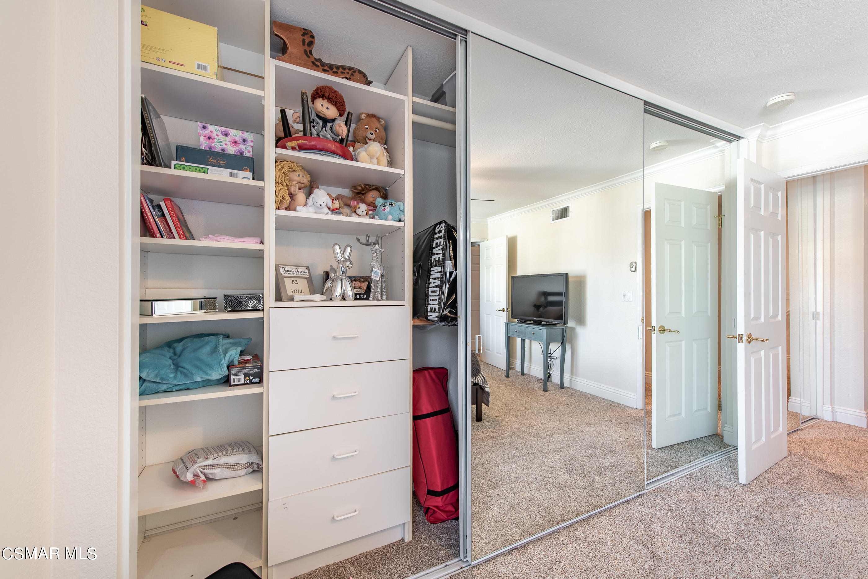 1940 Rory Lane, Unit 3 Simi Valley, CA 93063 - Photo 29 of 33 a view of walk in closet and chandelier