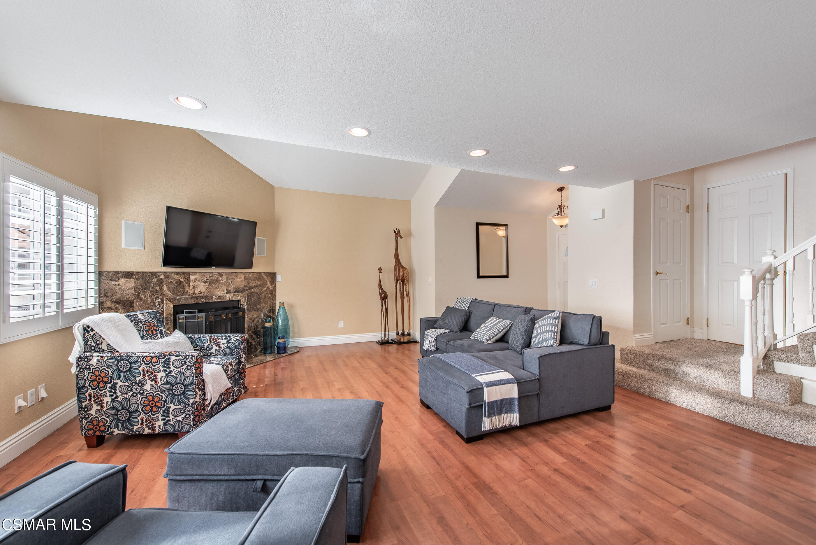 1940 Rory Lane, Unit 3 Simi Valley, CA 93063 - Photo 6 of 33 a living room with furniture and a flat screen tv