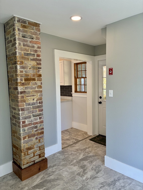 140 Mechanic Street Orange, MA 01364 - Photo 11 of 39 wooden floor in an empty room with a window
