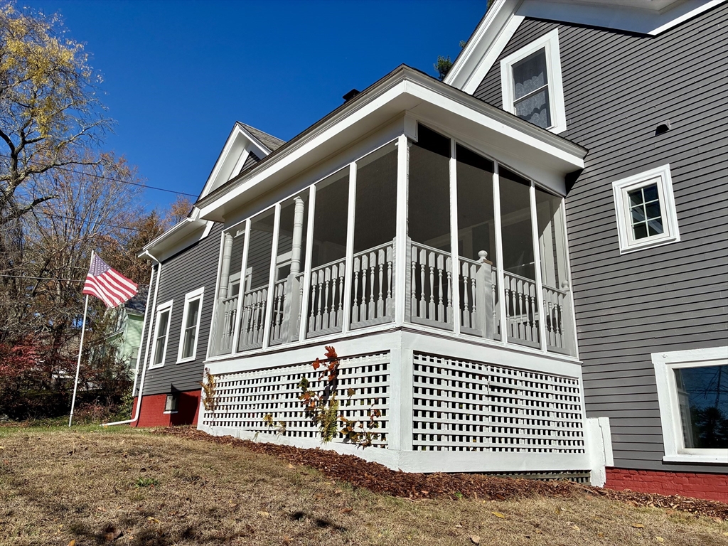 140 Mechanic Street Orange, MA 01364 - Photo 23 of 39 a front view of a house with a yard