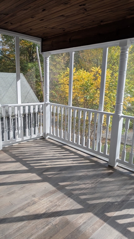 140 Mechanic Street Orange, MA 01364 - Photo 24 of 39 a view of a balcony with wooden floor
