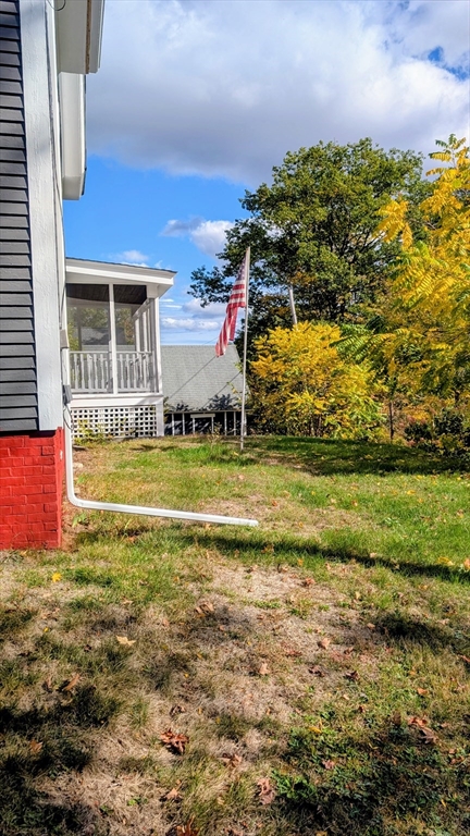 140 Mechanic Street Orange, MA 01364 - Photo 27 of 39 a view of a house with a yard