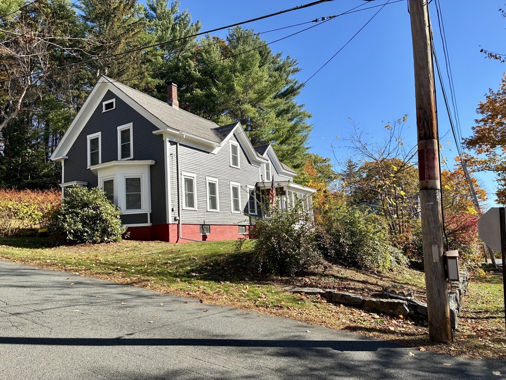 140 Mechanic Street Orange, MA 01364 - Photo 29 of 39 a house that has a tree in front of it