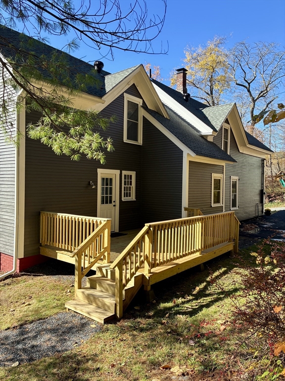 140 Mechanic Street Orange, MA 01364 - Photo 31 of 39 a view of a house with a yard