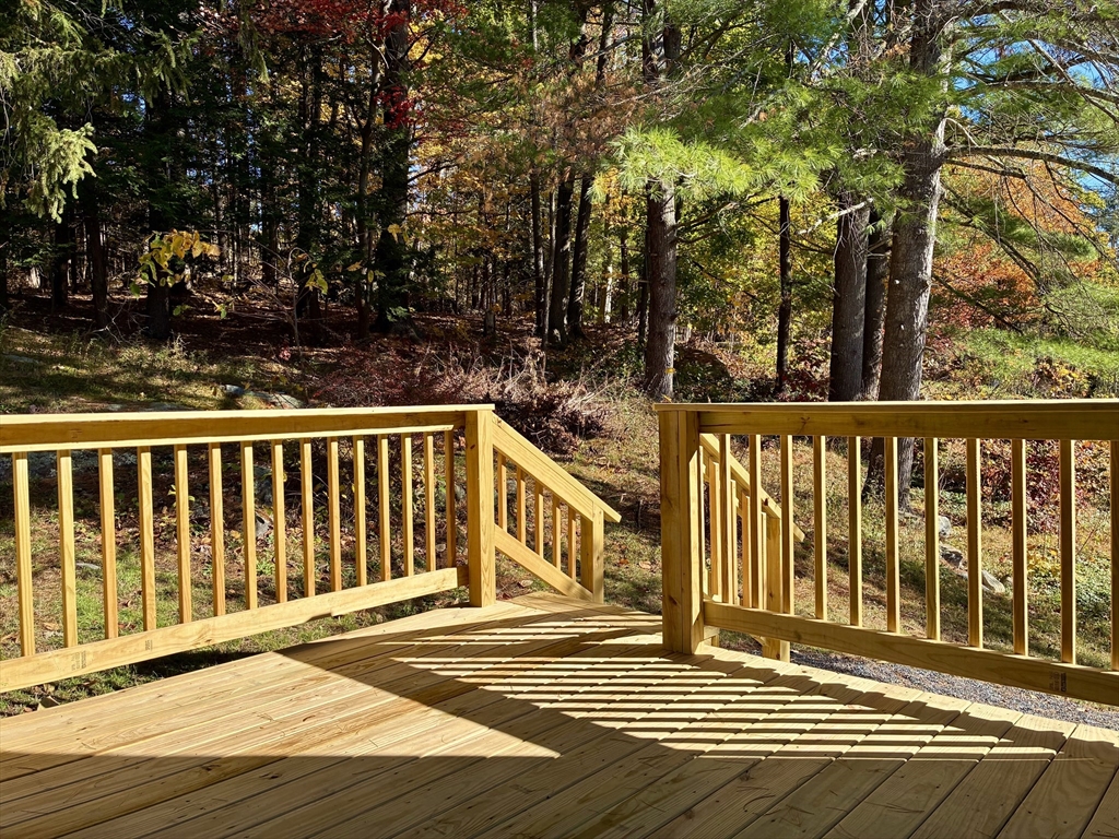 140 Mechanic Street Orange, MA 01364 - Photo 32 of 39 a view of a wooden deck