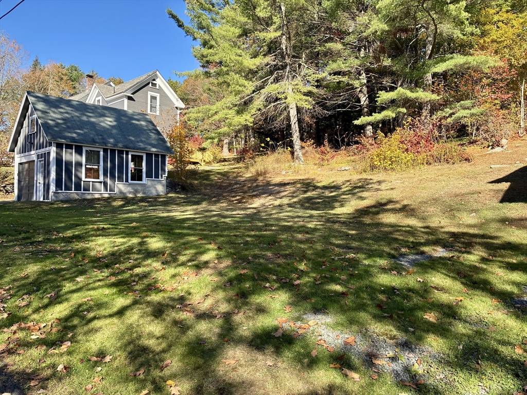 140 Mechanic Street Orange, MA 01364 - Photo 35 of 39 a view of a house with a big yard