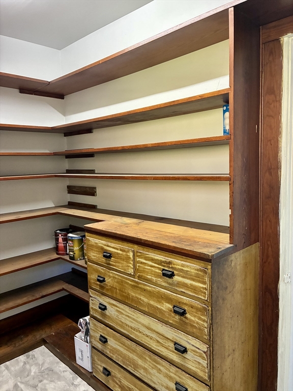 140 Mechanic Street Orange, MA 01364 - Photo 10 of 39 a view of walk in closet with empty racks