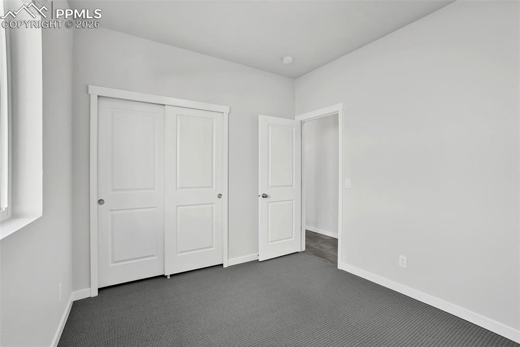 13641 Frost Bitten Grove Colorado Springs, CO 80921 - Photo 4 of 13 a view of an empty room